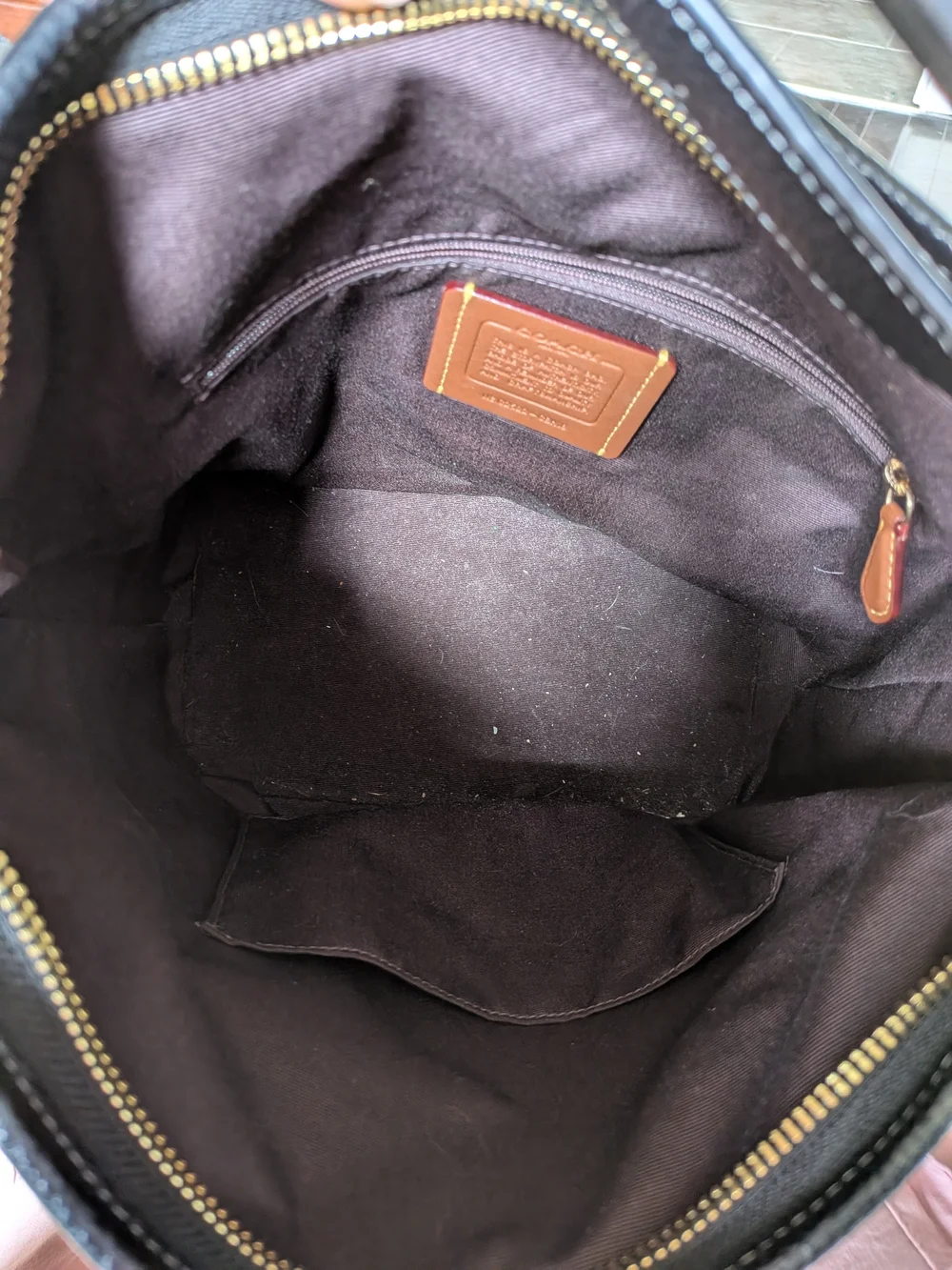 Coach Jude Duffel Bag in Black Pebbled Leather with Gold Hardware